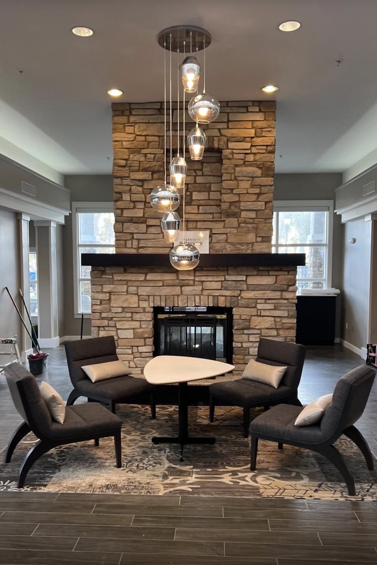 Finished residential common area with fireplace